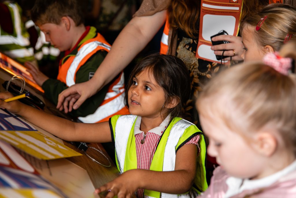 Children playing with an interactive in the Technology Gallery